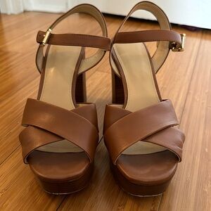 Luggage color, Michael Kors, sandals.